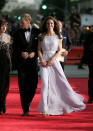 <p>The Duchess of Cambridge looked to go-to label Alexander McQueen for sartorial assistance back in 2011 while Prince William opted for a traditional tux. (Getty Images)</p> 