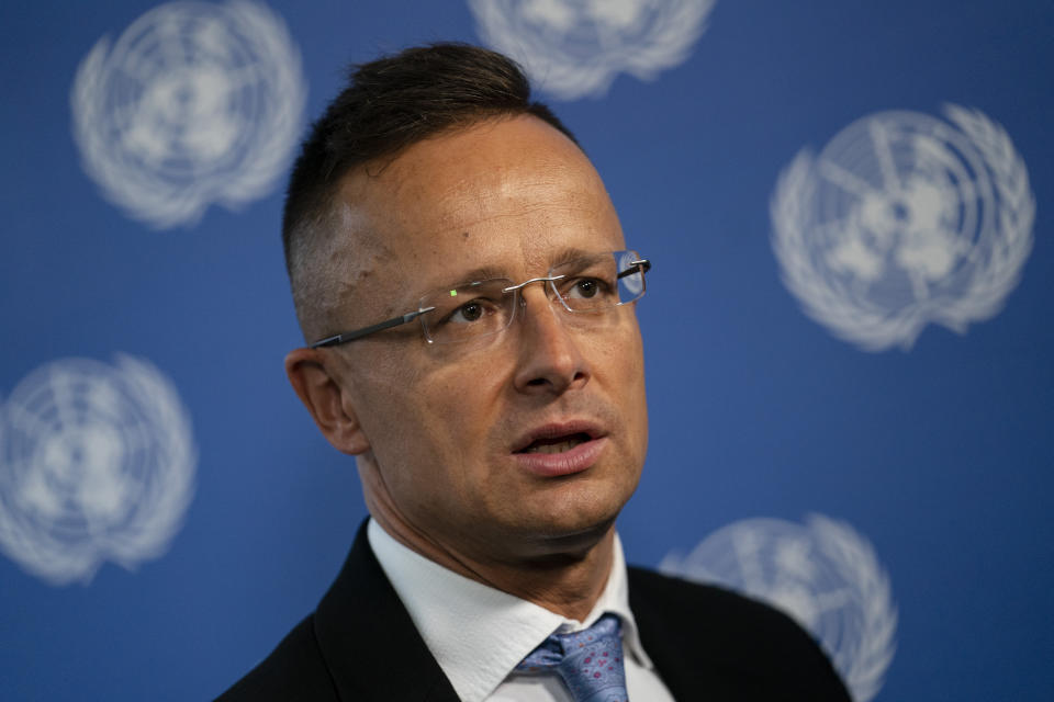 Peter Szijjarto, Hungary's minister of foreign affairs and trade, speaks during an interview with the Associated Press at United Nations headquarters, Thursday, Sept. 23, 2021, during the 76th Session of the U.N. General Assembly in New York. (AP Photo/John Minchillo)