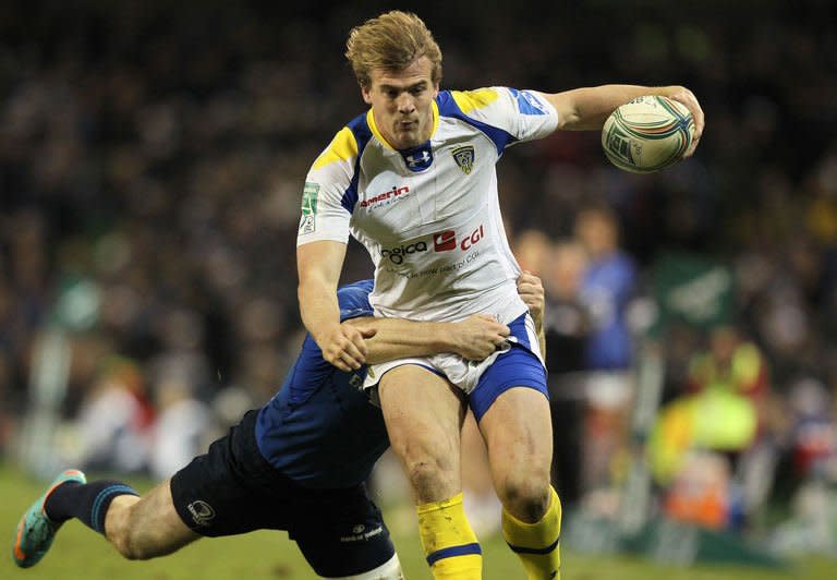 Clermont's Aurelien Rougerie (R) is tackled by Leinster's Eoin Reddan during their European Cup rugby union match at Aviva Stadium in Dublin, Ireland on December 15, 2012. Two-time defending champions Leinster were left teetering on the edge of going out in the pool stage of this season's European Cup after being outplayed in a 28-21 defeat at home to French side Clermont