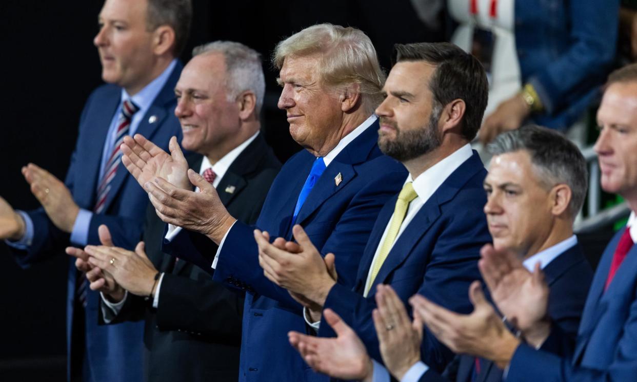 <span>Donald Trump (center) and JD Vance (center right) at Fiserv Forum in Milwaukee, Wisconsin, on 16 July 2024. </span><span>Photograph: Jim Lo Scalzo/EPA</span>