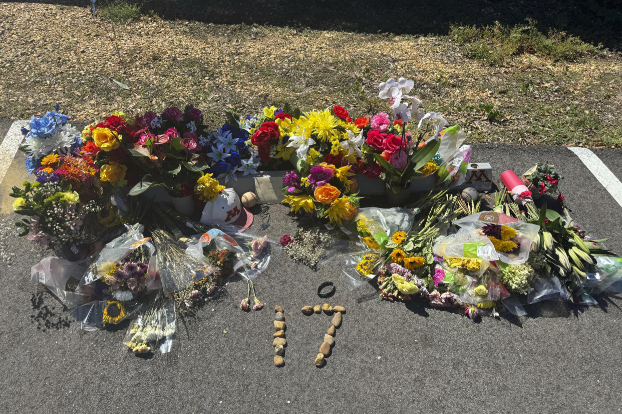 A memorial for 16-year-old Caden Tellier is seen in the parking lot of Morgan Academy in Selma, Ala., on Aug. 26. 