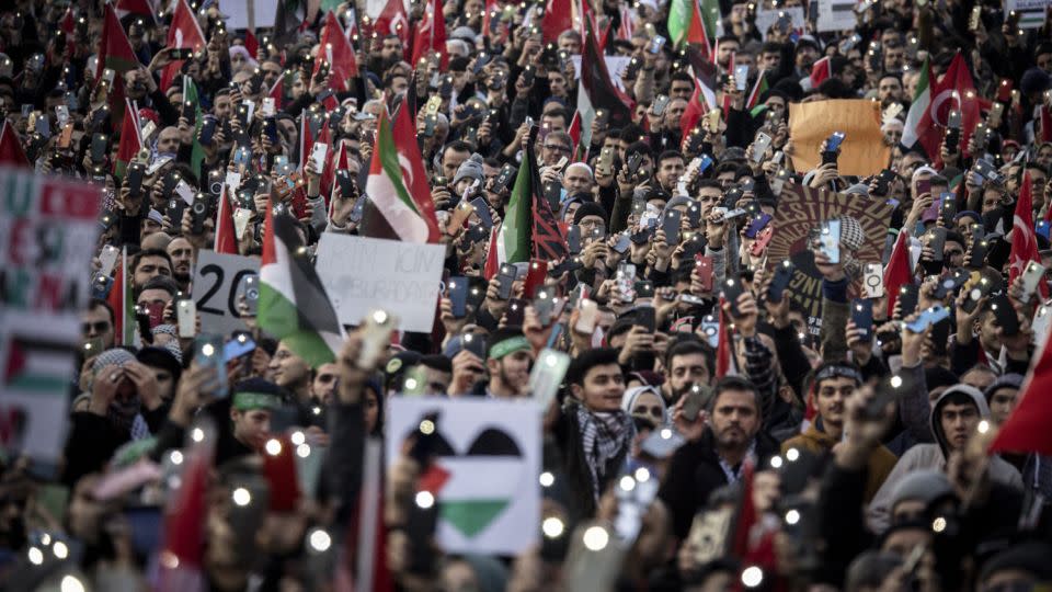 People protest in solidarity with Palestinians in Gaza and the West Bank in Istanbul, Turkey on January 1. - Chris McGrath/Getty Images