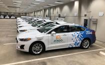 FILE PHOTO: A row of Ford Fusion Hybrid sedans outfitted with sensors and other self-driving equipment in Argo’s test garage