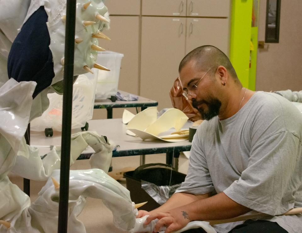 Ruben Ulises Rodriguez Montoya works on his sculpture for the upcoming "Outbursts Projects" exhibition at the Palm Springs Art Museum in Palm Springs, Calif., on July 21, 2022.