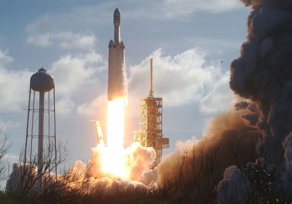 The SpaceX Falcon Heavy rocket lifts off from launch pad 39A at Kennedy Space Center on February 6, 2018 in Cape Canaveral, Florida. The rocket is the most powerful rocket in the world and is carrying a Tesla Roadster into orbit.