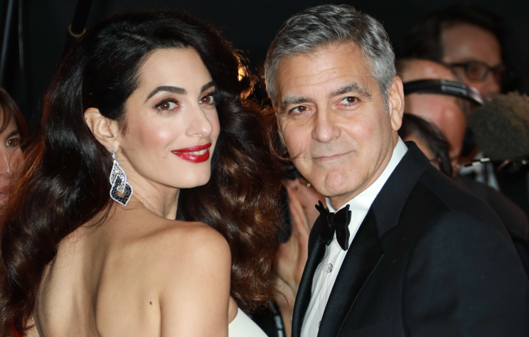 George and Amal Clooney have just become parents to twins. [Photo: LAURENTVU/SIPA/REX/Shutterstock]