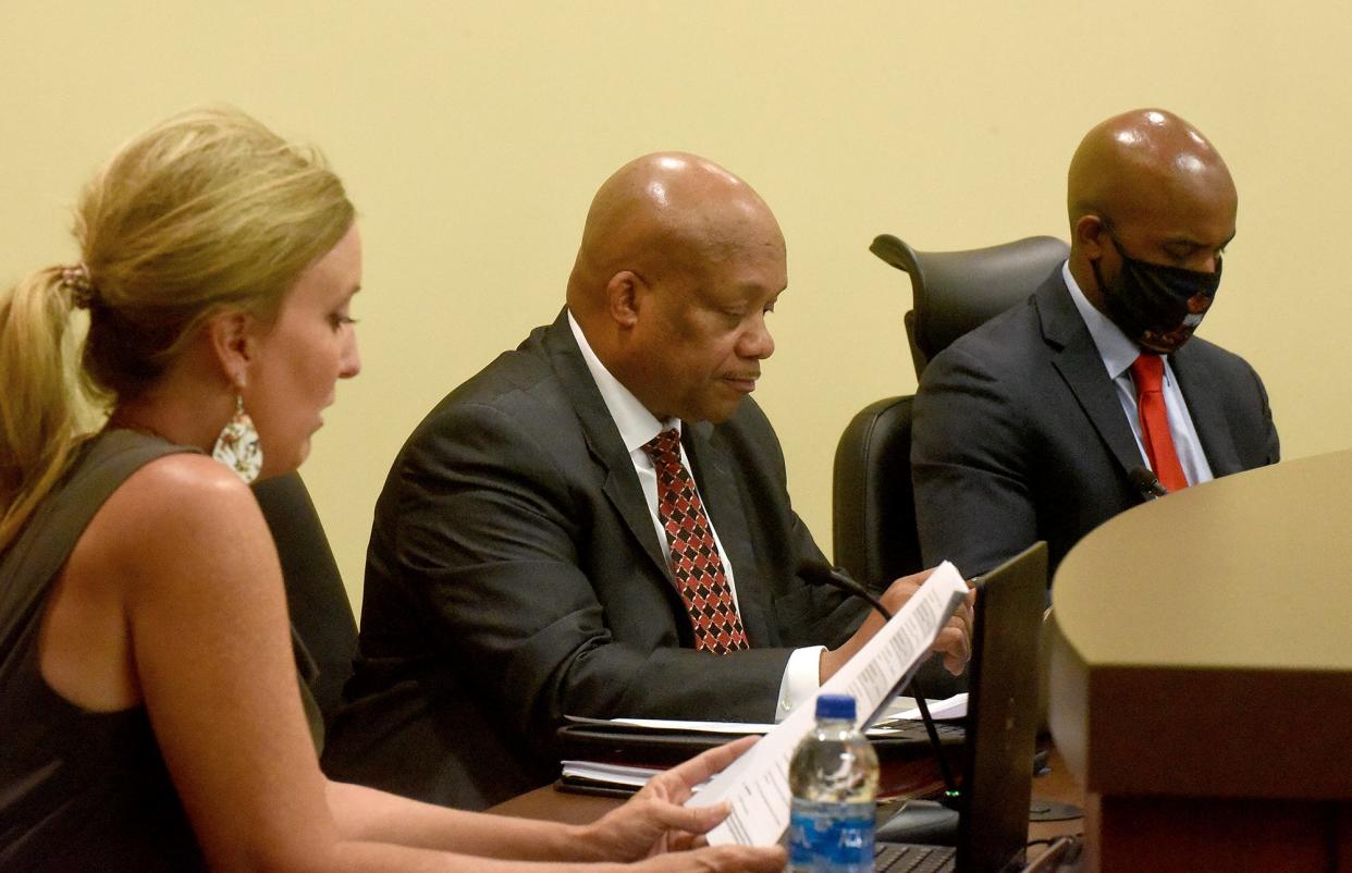 Columbia Public Schools Chief Financial Officer Heather McArthur talks about expenses for Hickman High School with Superintendent Brian Yearwood and board member David Seamon last year. The meeting was Yearwood’s first school board meeting since becoming CPS superintendent.