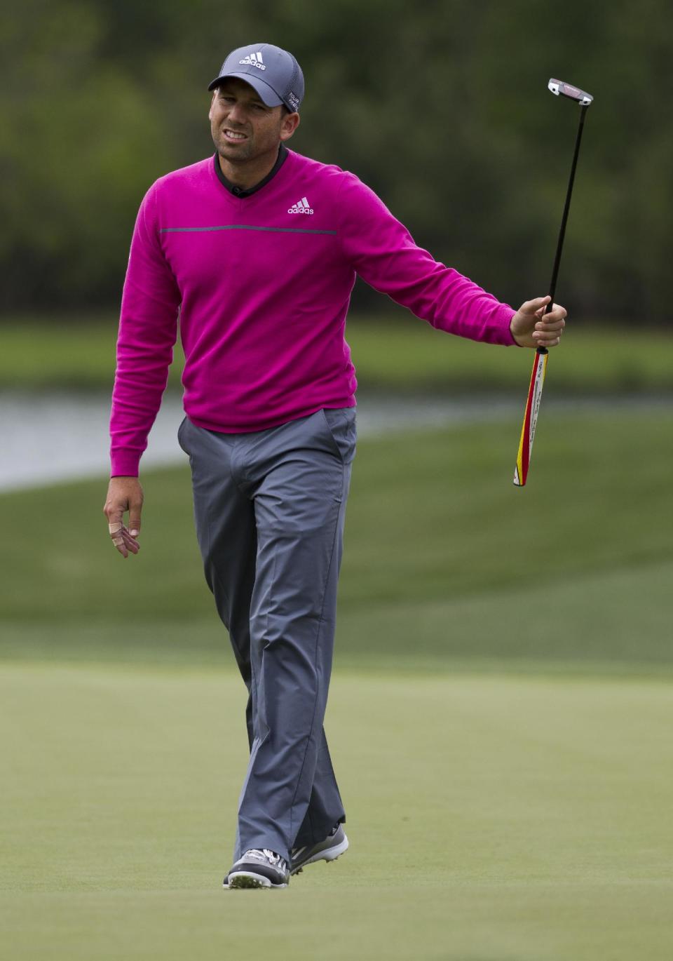 Sergio Garcia reacts after missing a putt for birdie on the eighth hole during the third round of the Houston Open golf tournament on Saturday, April 5, 2014, in Humble, Texas. (AP Photo/Patric Schneider)