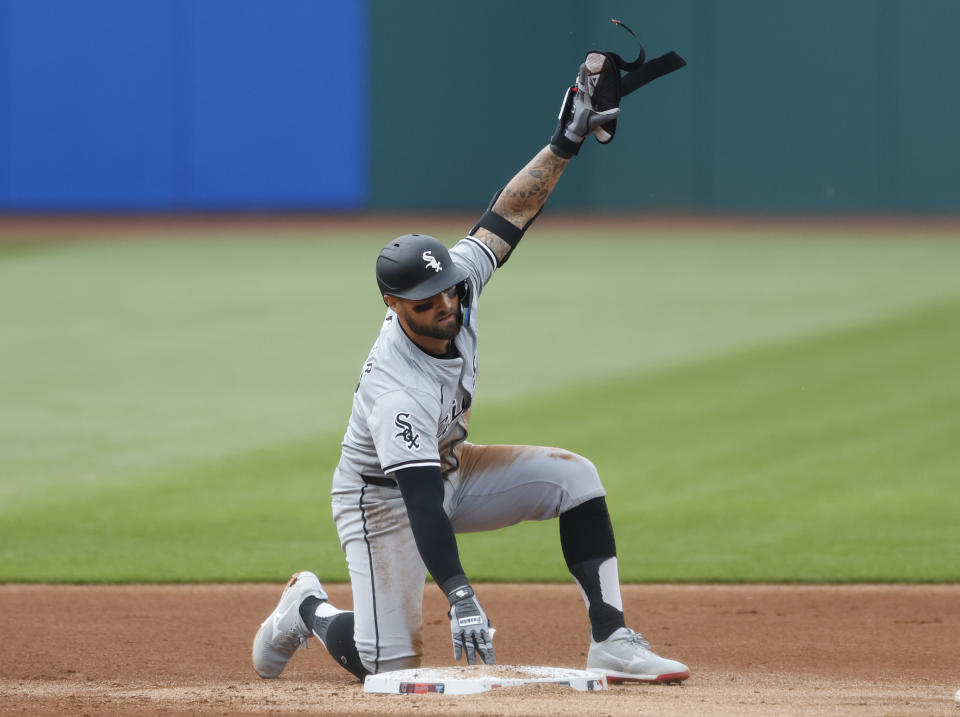 Chicago White Sox's Kevin Pillar celebrates after hitting a two-run double off Cleveland Guardians pitcher Logan Allen during the first inning of a baseball game, Tuesday, April 9, 2024, in Cleveland. (AP Photo/Ron Schwane)