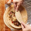 <p>Save money and sodium when you make a batch of homemade frozen burritos. Mashing the beans and mixing them with tomatoes, cheese and jalapeños before filling the healthy burritos means you get all the ingredients in each bite. Serve with your favorite toppings--we like sour cream, salsa and hot sauce. <a href="https://www.eatingwell.com/recipe/259643/rice-bean-freezer-burritos/" rel="nofollow noopener" target="_blank" data-ylk="slk:View Recipe;elm:context_link;itc:0;sec:content-canvas" class="link ">View Recipe</a></p>