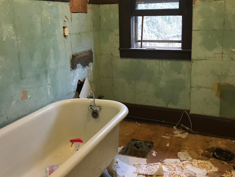 One of the bathrooms when they first bought the place.