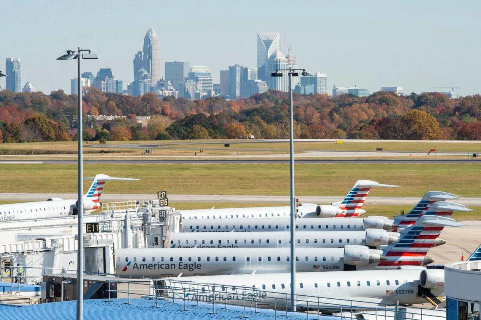 A woman on a July American Airlines flight to Charlotte has been fined more than $81,000 after she hit, bit and pushed flight attendants.
