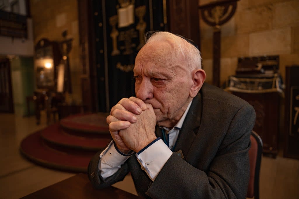 Roman, a survivor of the Holocaust in Ukraine, in tears worries his grandchildren and the younger generations will suffer the trauma he did  (Bel Trew)