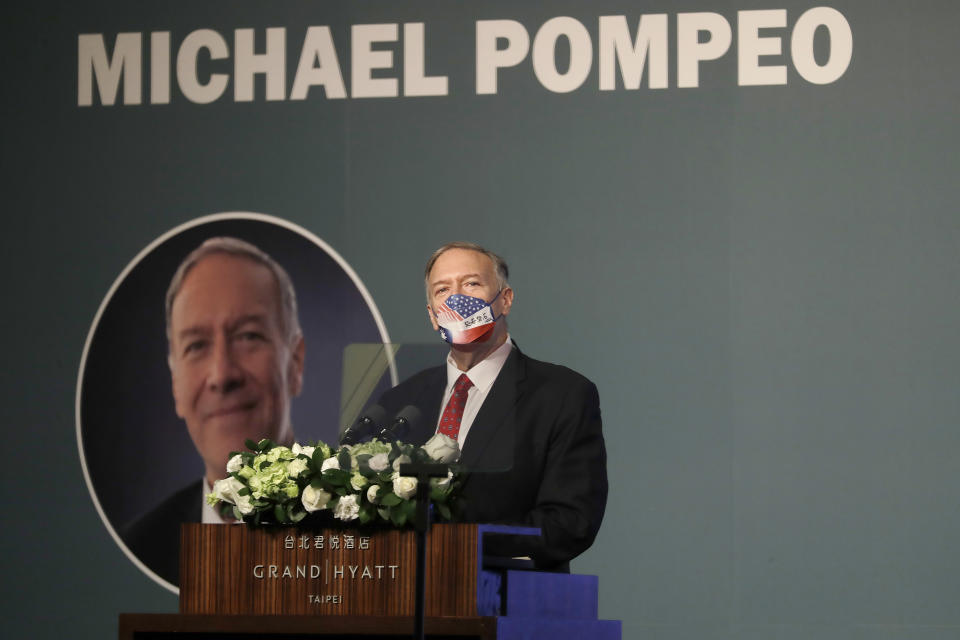 Former U.S. Secretary of State Mike Pompeo delivers a speech during his four-day trip to Taiwan in Taipei, Taiwan, Friday, March 4, 2022. (AP Photo/Chiang Ying-ying)