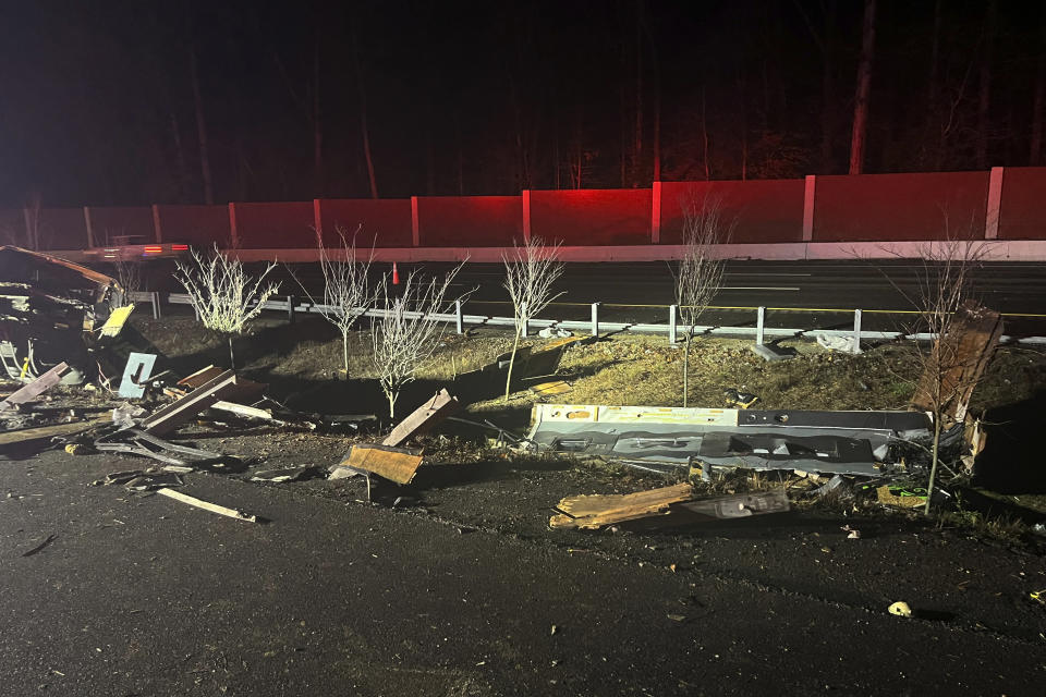This photo from Virginia State Police shows debris at the scene of a crash on Interstate 64 in in York County Virginia early Friday, Dec. 16, 2022. The crash occurred just after 1:30 a.m. near Williamsburg, which is located between Richmond and Norfolk. (Virginia State Police via AP)