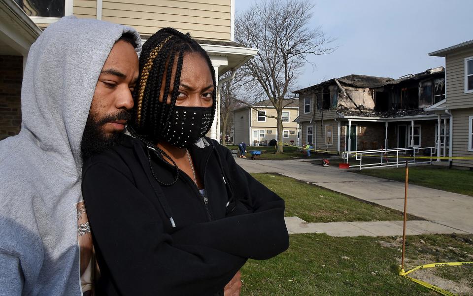 Kimberly Gray-Horton of Monroe and her three small children ages 6, 3, and 2 lost everything due to the apartment fire at Greenwood Townhouses early Easter Sunday, April 4, 2021 is hugged by her boyfriend Shaquille Wilkerson. "My kids and I lost everything, said Gray-Horton, not sure where to turn to for help."