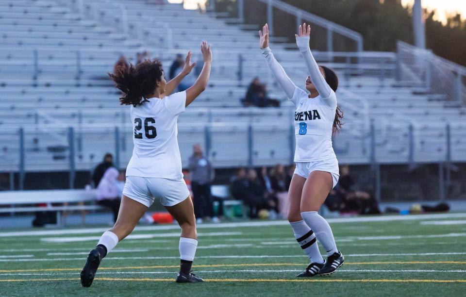 Buena's Kayalily Penn (26) celebrates scoring a goal with Amalia Nolan during the Bulldogs' 4-1 victory over Pacifica in a Channel League match on Tuesday, Jan. 23, 2024. Buena clinched the outright league championship.