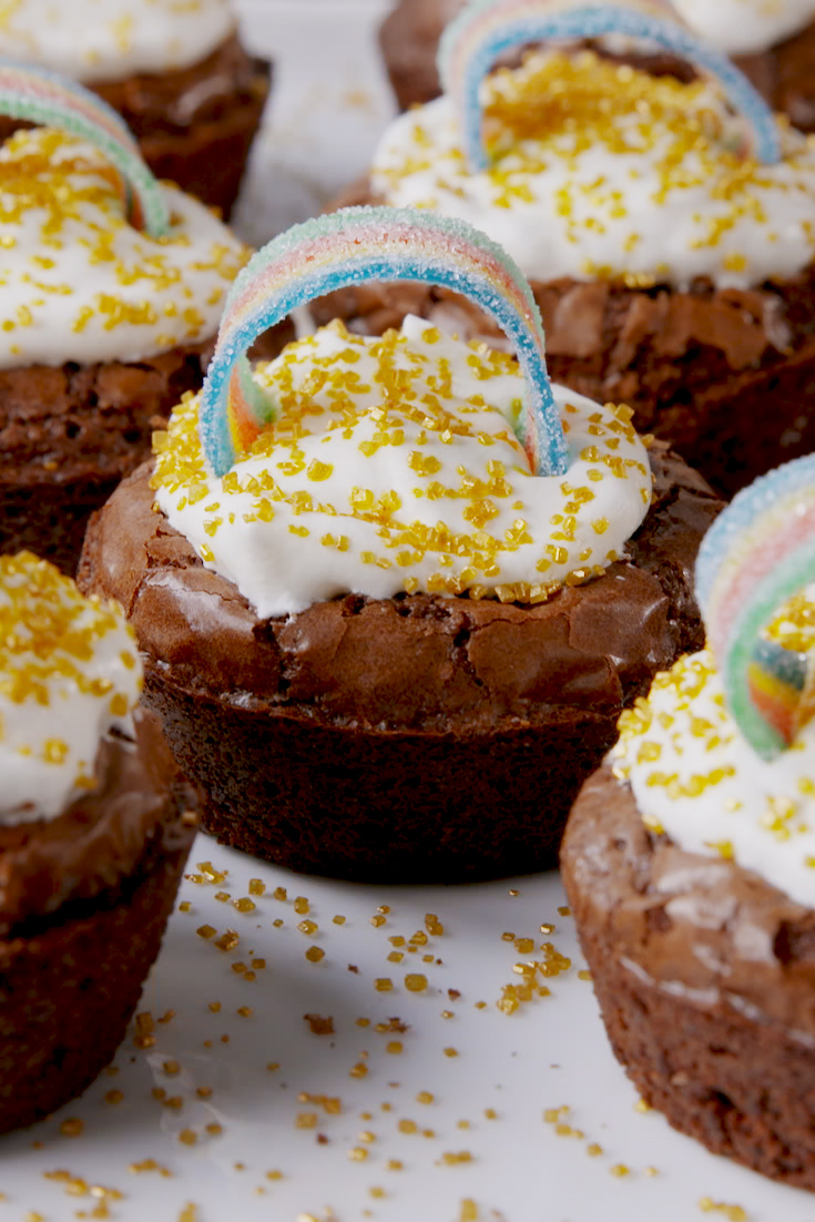 <p>These bite-size brownies prove that you don't have to go to the end of the rainbow to find the perfect St. Paddy's Day dessert. </p><p>Get the <strong><a href="https://www.delish.com/cooking/recipe-ideas/recipes/a58553/pot-o-gold-cups-recipe/" rel="nofollow noopener" target="_blank" data-ylk="slk:Pot O' Gold Cups recipe;elm:context_link;itc:0;sec:content-canvas" class="link ">Pot O' Gold Cups recipe</a> </strong>from Delish.  </p>