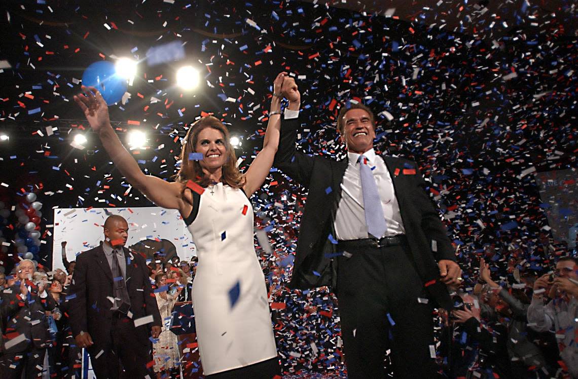 Arnold Schwarzenegger is joined by his wife Maria Shriver in Los Angeles on Oct. 7, 2003, as he celebrates his victory in the California gubernatorial recall election. Randy Pench/Sacramento Bee Staff Photo
