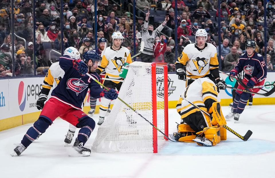 Columbus Blue Jackets center Boone Jenner (38) scores a goal past Pittsburgh Penguins goaltender Casey DeSmith (1) during the first period of the NHL hockey game at Nationwide Arena in Columbus on Friday, Jan. 21, 2022. 
