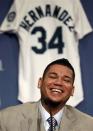 Seattle Mariners' Felix Hernandez smiles during a news conference Wednesday, Feb. 13, 2013, in Seattle. Hernandez signed a seven-year contract with the Mariners that makes him the highest-paid pitcher in baseball, a new deal that will be worth $175 million. The contract covers the final two years of his current deal that was scheduled to run through the 2014 season and adds five additional years through the 2019 season. (AP Photo/Elaine Thompson)