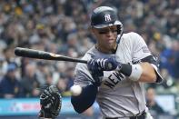 New York Yankees' Aaron Judge is hit by a pitch during the sixth inning of a baseball game against the Milwaukee Brewers Sunday, April 28, 2024, in Milwaukee. (AP Photo/Morry Gash)