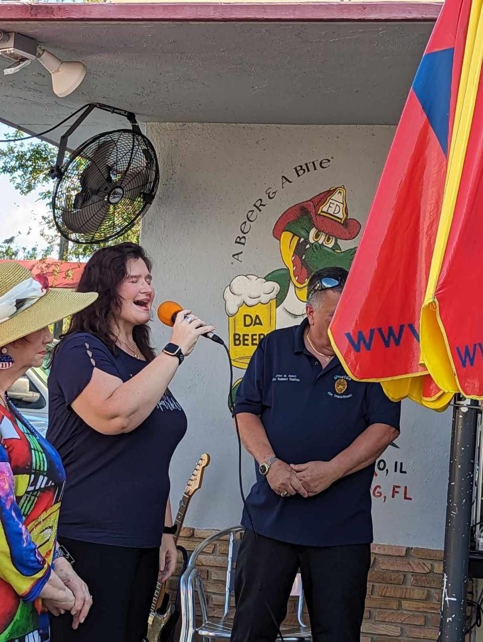 Joa Jane Harpster performed the National Anthem at the 9/11 remembrance ceremony held in downtown Leesburg Monday.