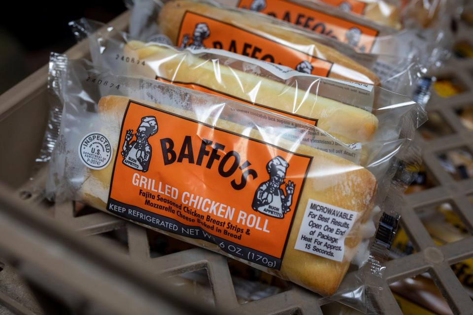 A plastic container of Baffo's Enterprise grilled chicken roll sandwiches sits inside the Baffo's Enterprise Inc. bakery in Riverview on Wednesday, March 6, 2024.