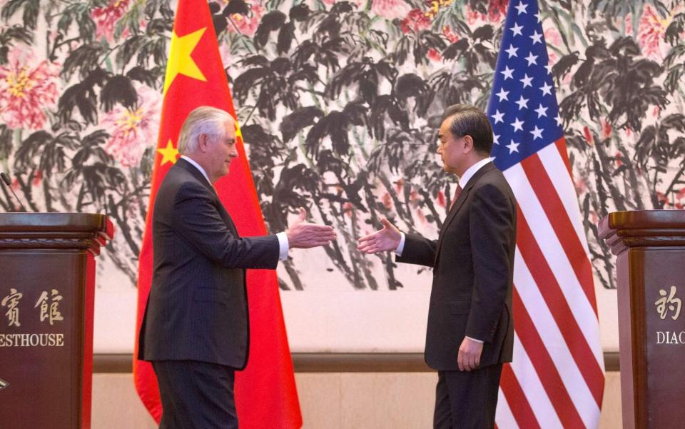 US Secretary of State Rex Tillerson and Chinese Foreign Minister Wang Yi - AFP