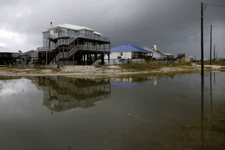 Flood waters from Tropical Storm Gordon are seen in front of a house in Dauphin Island, Alabama, U.S., September 5, 2018. REUTERS/Jonathan Bachman