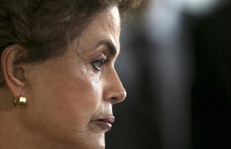 President Dilma Rousseff attends a news conference after visiting the new Embraer KC 390 military transport aircraft in Brasilia, Brazil April 5, 2016. REUTERS/Adriano Machado