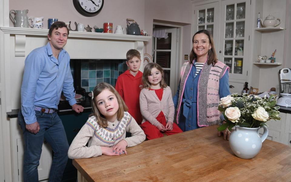 Pix show Jo Saunders, her husband Charlie Saunders and children Max (11, in red fleece),Molly (8, in blue skirt) and Mary (5, in red trousers) at their country home in Cove, Devon.Pix Jay Williams 15-02-23 - Jay Williams