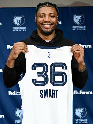 <p>David Dow/NBAE/Getty</p> Marcus Smart during a press conference on July 7, 2023