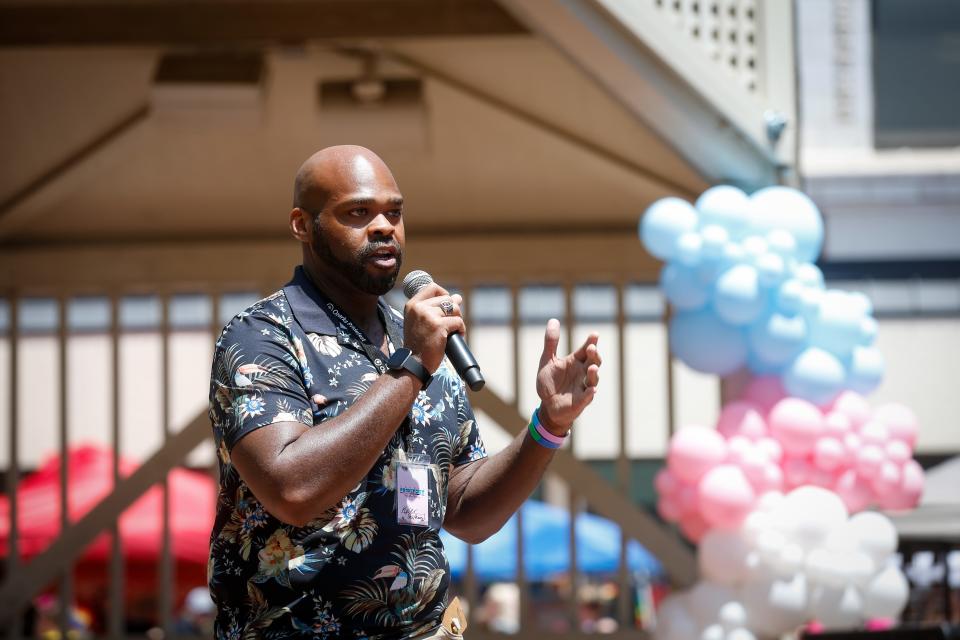 The GLO Center Board President Kyler Sherman-Wilkins provides opening remarks during Ozarks Pridefest at Park Central Square on Saturday, June 10, 2023.