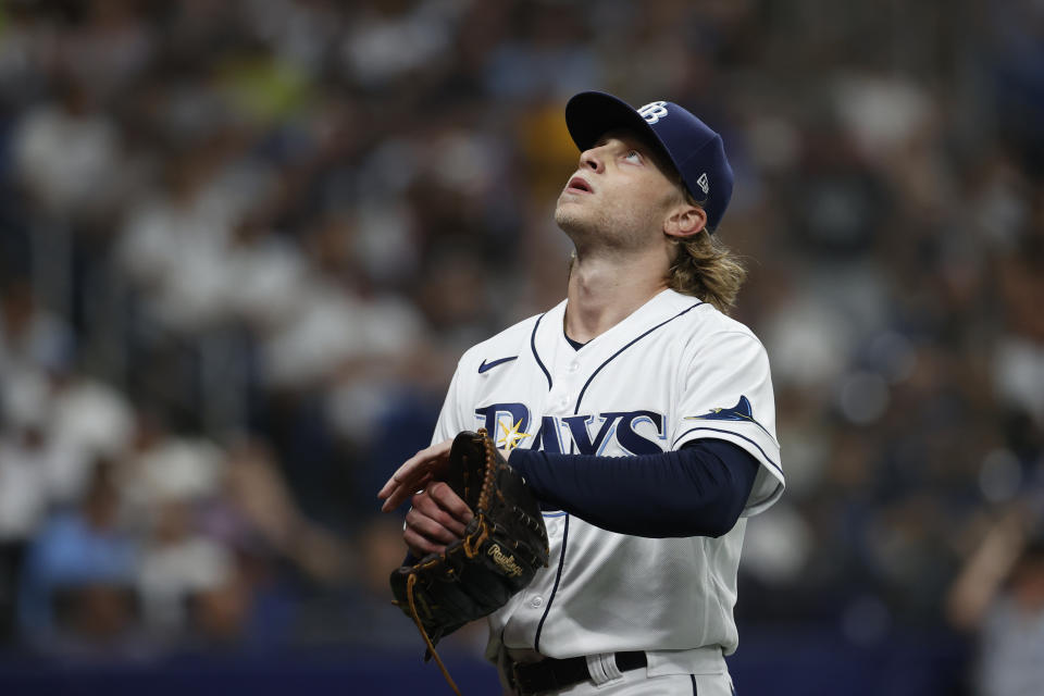 Tampa Bay Rays starting pitcher Shane Baz heads to the dugout after being removed during the fifth inning of the team's baseball game against the New York Yankees on Wednesday, June 22, 2022, in St. Petersburg, Fla. (AP Photo/Scott Audette)
