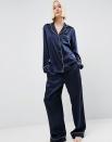 <p>For the ultimate in grown-up luxury, there's nothing like slipping into cool, 100% silk pyjamas. This chic set will be an investment for years to come. <a rel="nofollow noopener" href="http://tidd.ly/8c5d196a" target="_blank" data-ylk="slk:Buy Here;elm:context_link;itc:0;sec:content-canvas" class="link ">Buy Here</a> </p>