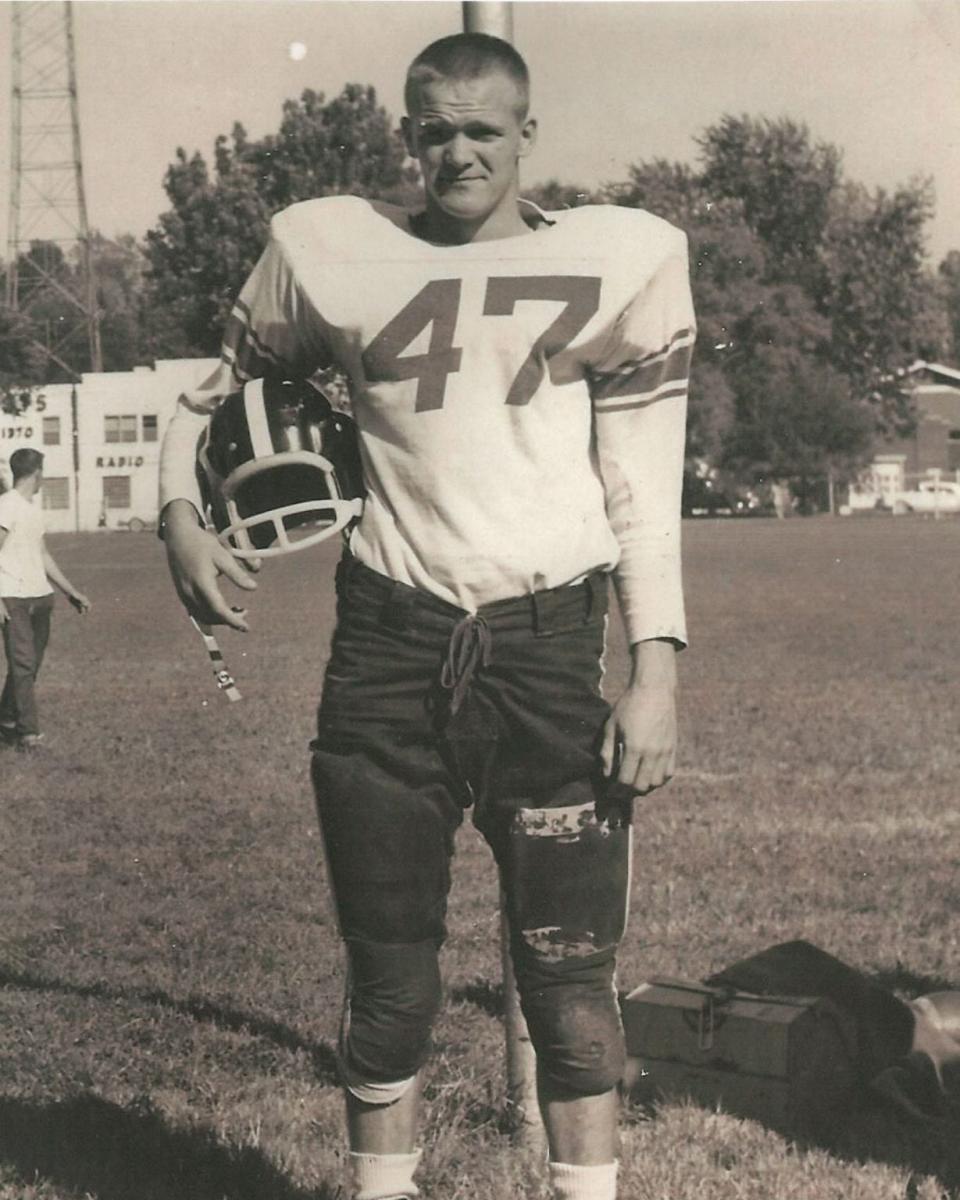 Ron Brinegar poses in his Bloomington High School football uniform.