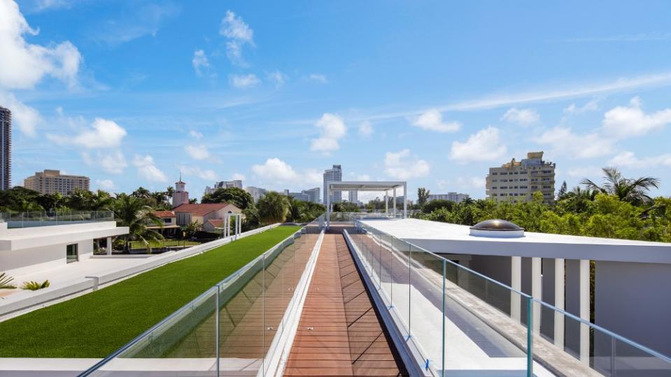 The rooftop deck features a pergola and artificial turf. - Credit: Lifestyle Photography Group