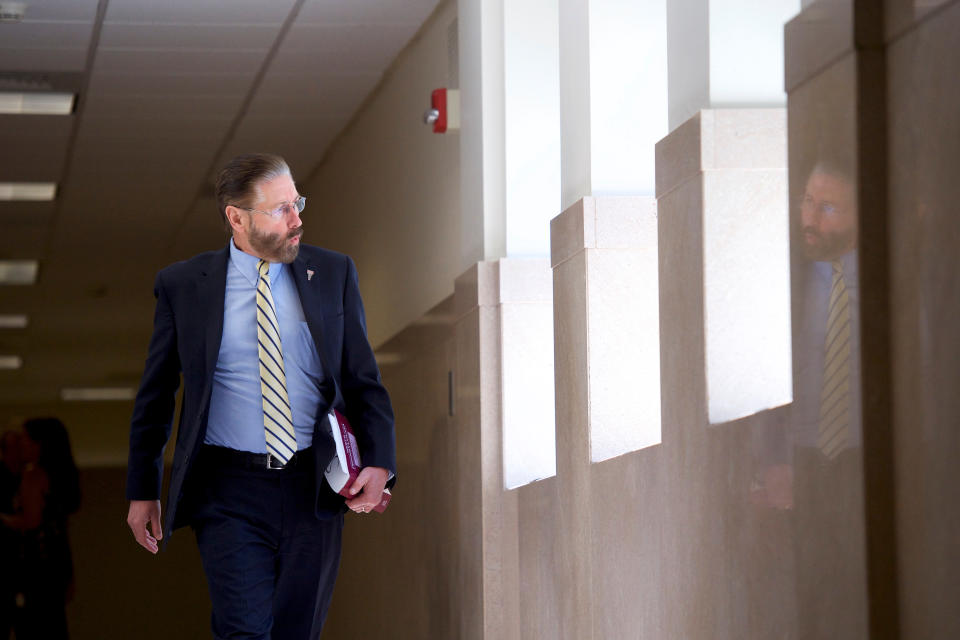 <p>Judge Steven T. O’Neill of the Montgomery County Court of Common Pleas whistles after learning the verdict is in, as he walks towards the courtroom for the verdict in the Bill Cosby sexual assault retrial at the Montgomery County Courthouse in Norristown, Pa., April 26, 2018. (Photo: Mark Makela/Pool via Reuters) </p>