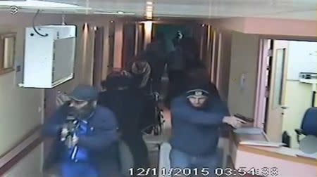 Israeli undercover forces are seen in this still image taken from Al-Ahli hospital CCTV and obtained by Reuters TV, during their raid of the hospital in the West Bank city of Hebron November 12, 2015. REUTERS/Hebron Al-Ahli Hospital Handout via Reuters TV