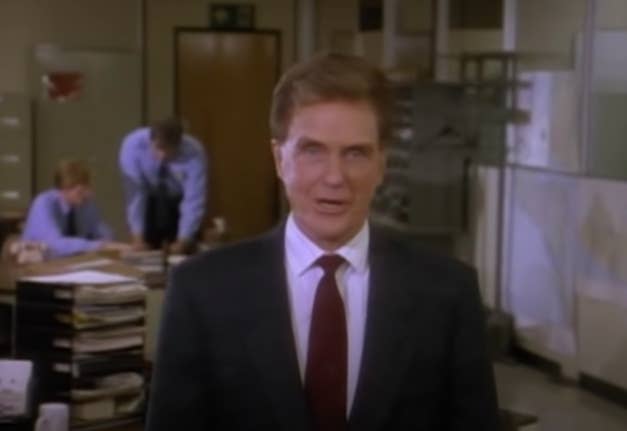 robert stack in an unassuming office