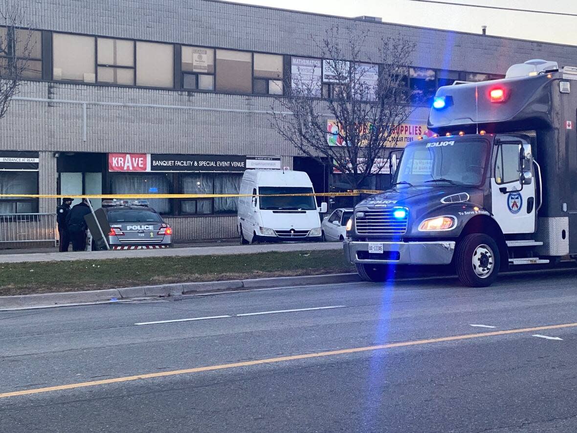 Toronto police said they were initially called to a plaza in the area of McCowan Road and Nugget Avenue on Dec. 13 at 3:48 a.m. for reports of a man shot inside of a nightclub.  (Paul Smith/CBC - image credit)