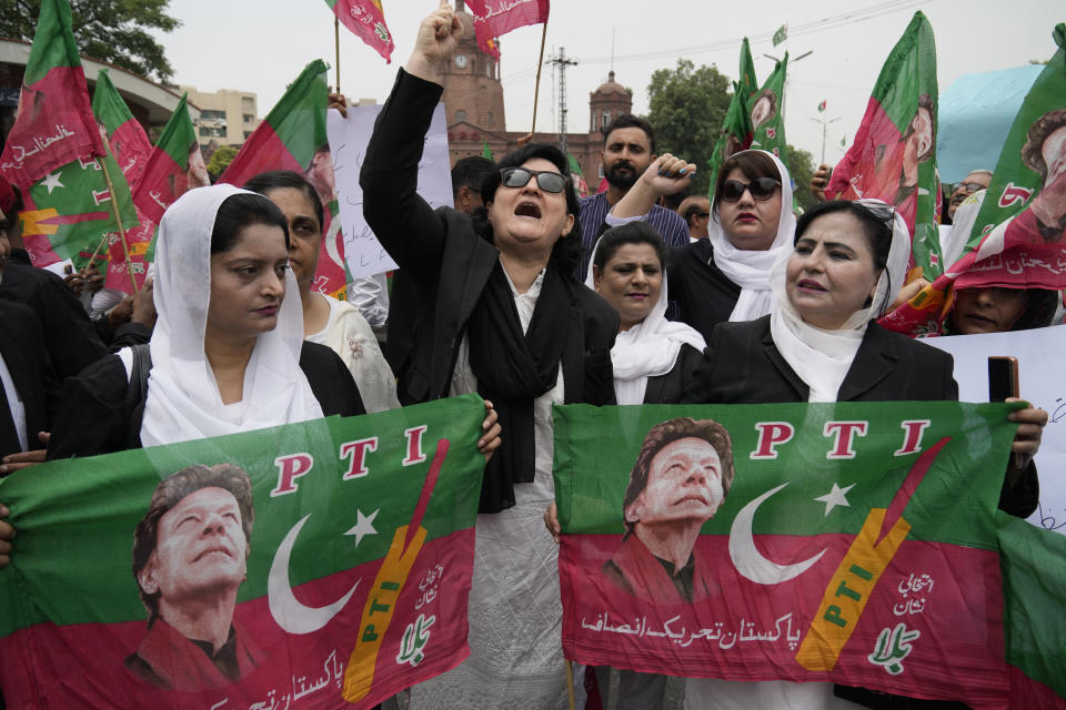 Lawyers, who support Pakistan's former Prime Minister Imran Khan, chant slogans during a protest against Khan's imprisonment, in Lahore, Pakistan, Monday, Aug. 7, 2023. Khan is now an inmate at a high-security prison after being convicted of corruption and sentenced to three years. (AP Photo/K.M. Chaudary)
