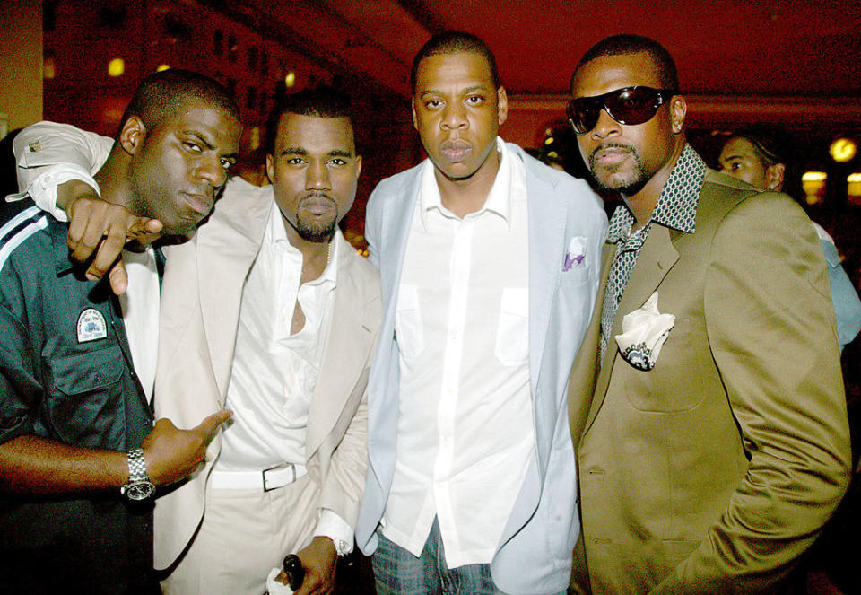 Rhymefest, Kanye West, Jay-Z, and Chris Tucker at an event