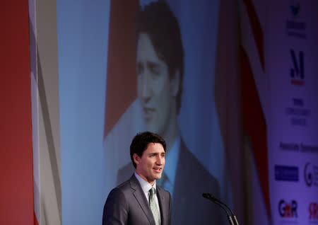 Canadian Prime Minister Justin Trudeau addresses a gathering during 'India-Canada Business Session', in New Delhi, India, February 22, 2018. REUTERS/Adnan Abidi