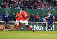 Croatia's Luka Modric, right, scores his side's opening goal during the UEFA Nations League soccer match between Austria and Croatia at the Ernst Happel Stadion in Vienna, Austria, Sunday, Sept. 25, 2022. (AP Photo/Florian Schroetter)