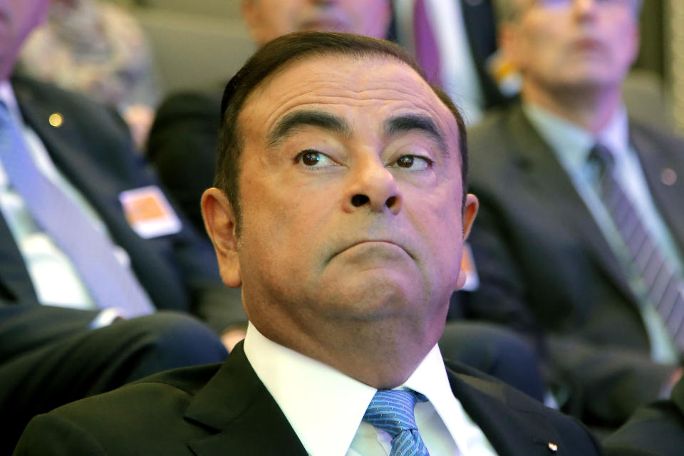 FILE - In this Oct. 6, 2017, file photo, former Nissan Motor chairman Carlos Ghosn attends a media conference outside Paris, France. Lawyers for Ghosn, who is awaiting trial in Japan, asked the Tokyo District Court on Thursday, Oct. 24, 2019 to dismiss all charges filed against him in his financial misconduct case. The papers his lawyers filed in the court last week allege prosecutorial misconduct will prevent Ghosn from having a fair trial. The fillings allege unlawful collusion between the prosecutors, government officials and executives at Nissan Motor Co. drummed up allegations of wrongdoing to remove him as chairman. (AP Photo/Michel Euler, File)