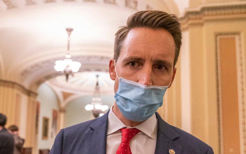 Senator Josh Hawley was the first Republican to announce he would try and interrupt the certification vote  - AP