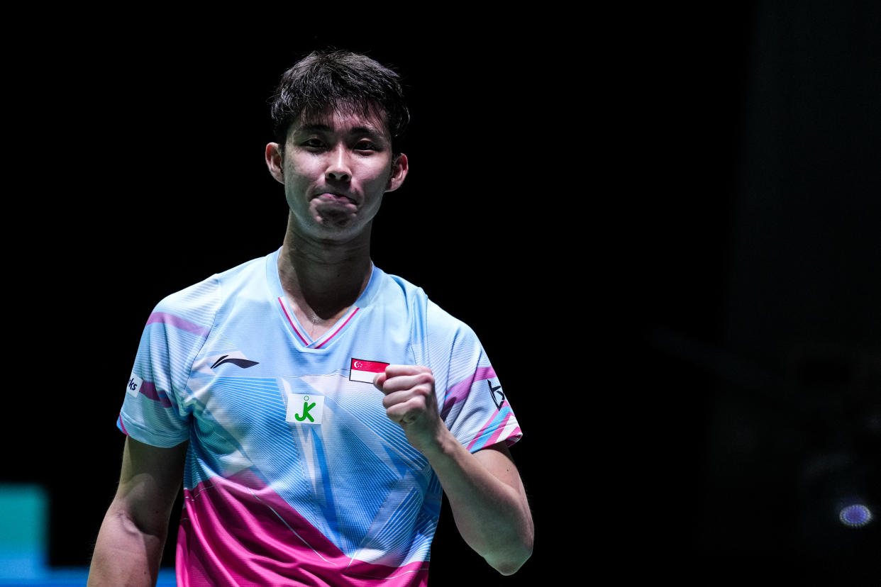 Singapore shuttler Loh Kean Yew pumps his fist as he celebrates winning a match during his BWF World Championships men's singles title defence in Tokyo.