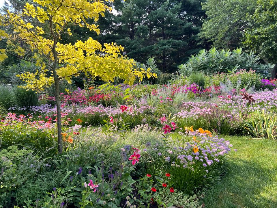 Later in the summer, the gardens in the backyard of the Muskego home of Casey and Kathie Palmisano are filled with color.